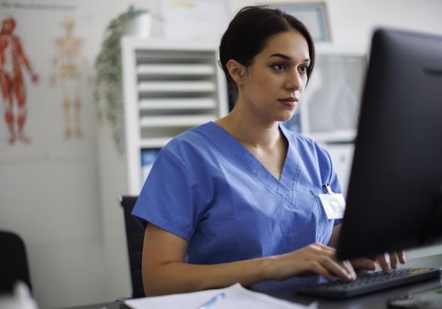 Healthcare student on computer