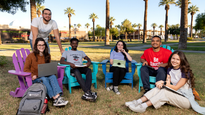 A group of Glendale Community College students sitting outside