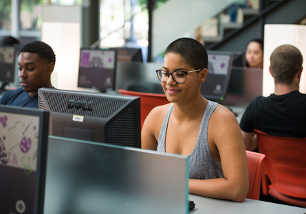 Woman sitting at computer