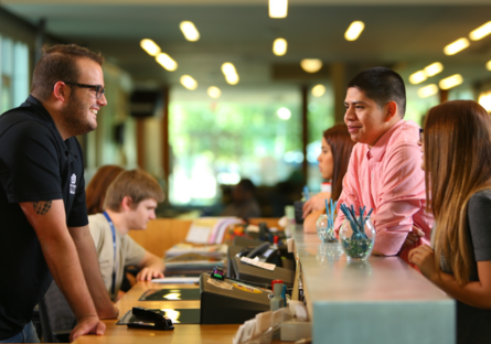 An image of students making an appointment at academic advising