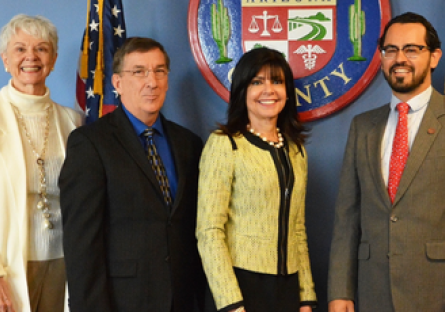 An image of Augustine Bartning with MCCCD Governing Board members, MCCCD Chancellor Harper-Marinick